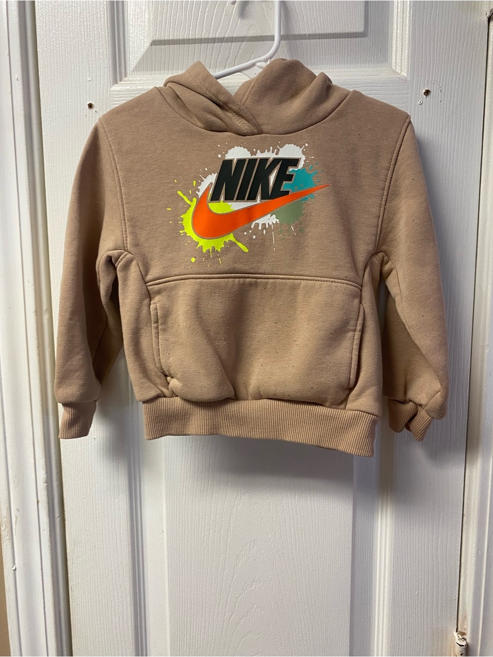 Nike Kids Tan Hoodie with Neon Orange Swoosh and Green Accent